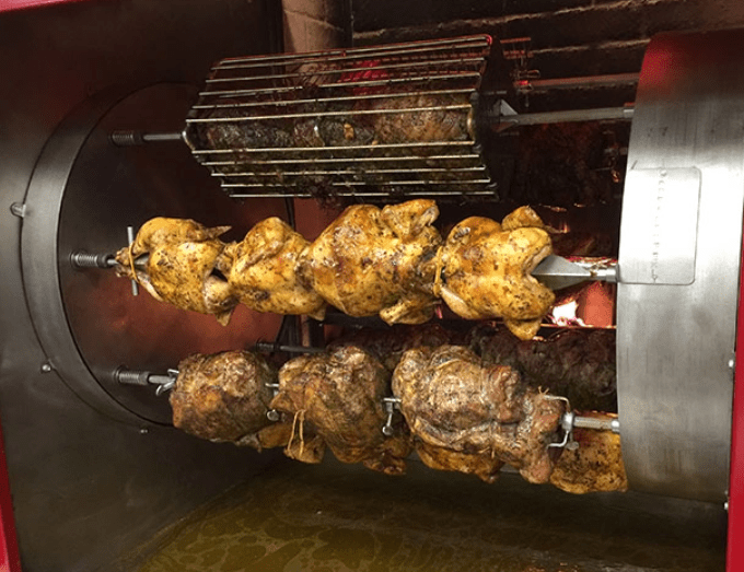 Chickens on a rotisserie cooker
